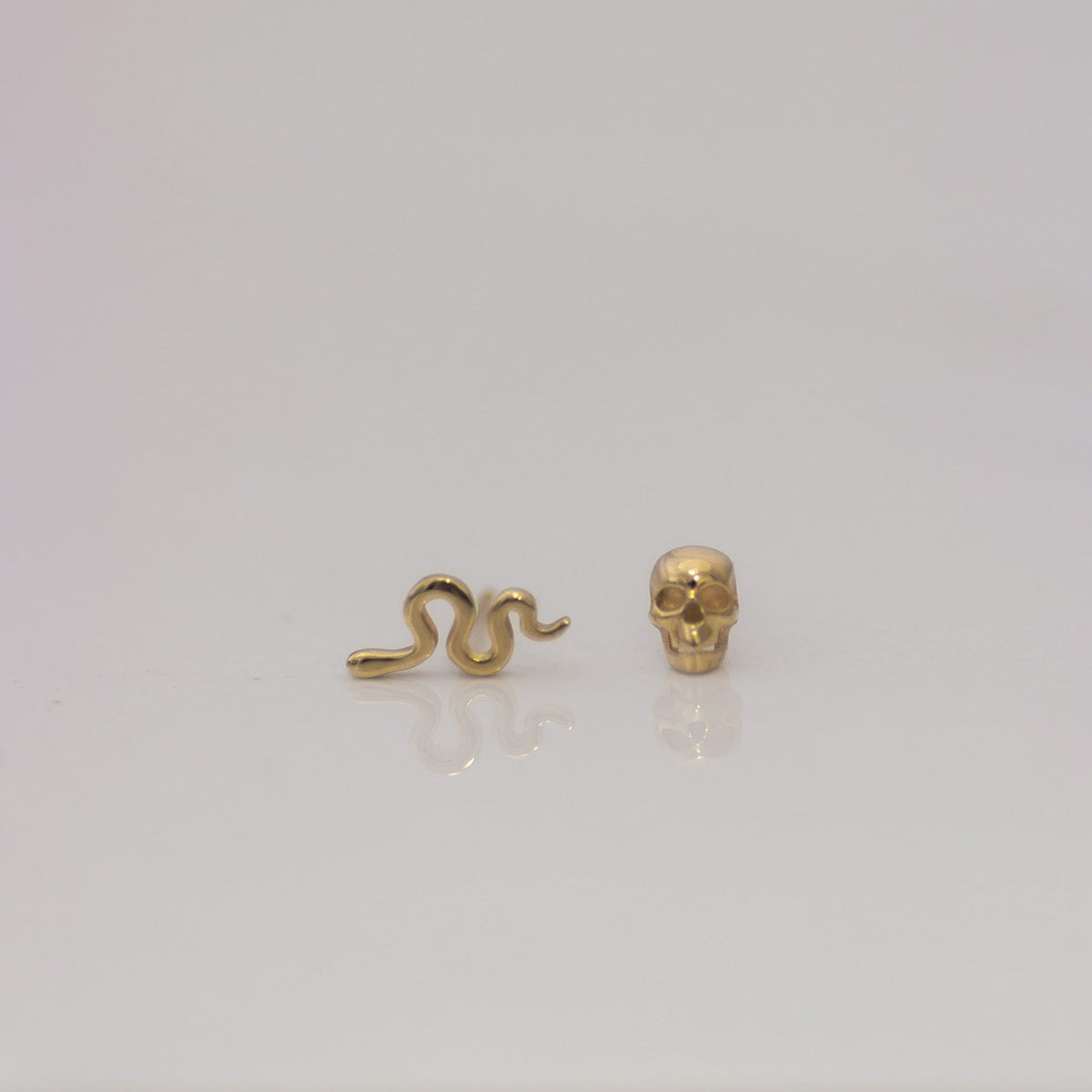 Snake stud 14k gold