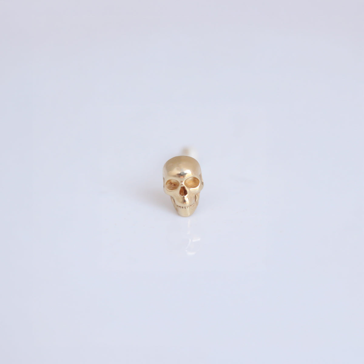 Skull stud 14k gold